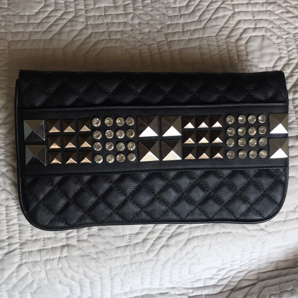 Studded black quilted clutch
